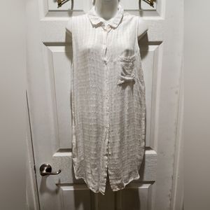 Long shirt sleeveless with opening on both sides